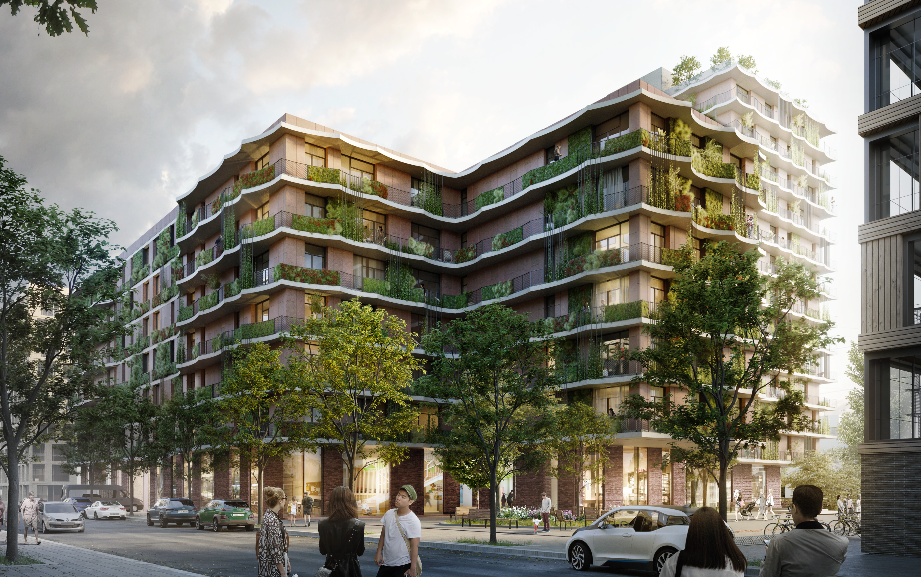 A modern multi-story apartment building featuring wavy, undulating balconies overflowing with lush green plants and hanging vines, situated on a busy city street at dusk.