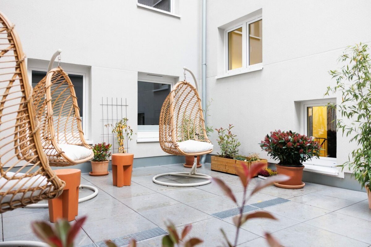 sunny terrace with hanging chairs for chilling in Aachen